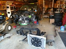 Got the fan mounted to the radiator and started trimming the radiator support to accept the Griffin radiator.