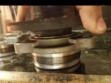 when I pick up the hub the wheelbearing comeout a bit. I dont think its normal. I took the bad bearing and it also did that any recomendations. I believe the hub is what is wrong