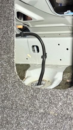 The bolt near by left rear seat area seems causing the squeaky or metallic popping noise, but i couldn’t find no nuts to tighten it… is it the bolt holding gas tank??