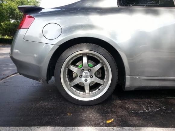 Cross drilled and slotted rotors painted Grabber Green