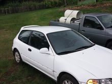 Installed the rocket bunny spoiler, after side moildings and mirrors come in I'll be ready for a new coat of paint along with my new set of rims and tires.