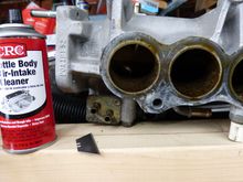 I had to clean up the plenum and scrape off the remaining gasket material.
