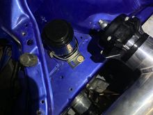 Mounted this cheap eBay overflow.. it’s not vented and I’m quite sure it should be. I’ll install a vent. Hose will run through the frame rail.. you shall see. Factory over flow would no longer fit with the intercooler piping in the way. 