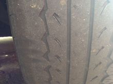 Cant really tell in the picture but the very inner edge has been wearing away faster than the middle-ish. Its almost like an icnh wide spot that is getting worn the fastest and where the wire stared to show.