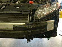 Marking where to cut crash beam foam in order to make room for tow point mounting