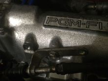 throttle cable mount. I was going to drill some new holes in the mount but couldn't find the drill under all of my mess.