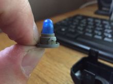 this is the full bulb assembly. do not try to pull it apart. New ones you order or buy should look just like this. put it in the hole. twist it back in to lock it in position. and put back together.
