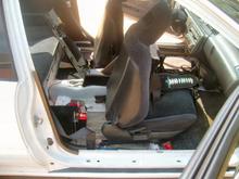 car was stripped....replaced door panels, painted acccessories black, put in carpet