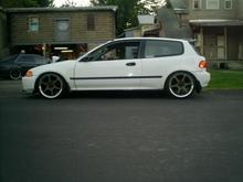 white hatch lookin right with buddy club rims