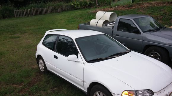 Installed the rocket bunny spoiler, after side moildings and mirrors come in I'll be ready for a new coat of paint along with my new set of rims and tires.
