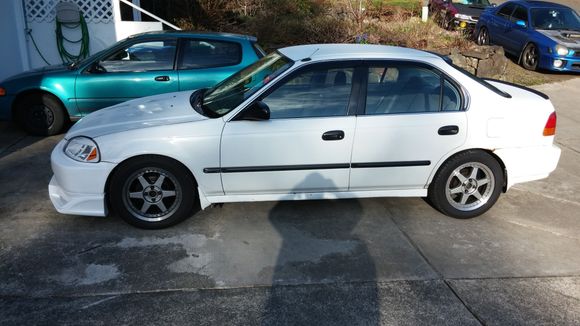 side shot so you can see how tall the lip is. also going to be selling these wheels soon if anyone is interested. they are rare 2 piece aproma wheels 16x7. they wont have tires though. those go on the new wheels. just shoot me a pm if you're interested.
