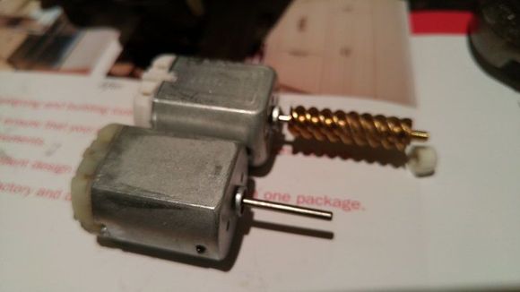 Showing both old and new motor with carbon brushes swapped