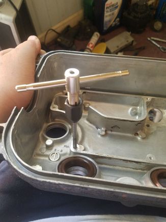 tapping holes for the baffle plate