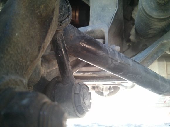 Link leaning forward over arm