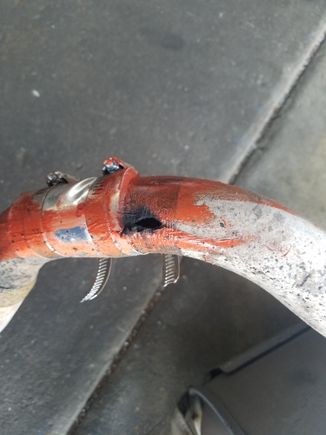 Old b pipe. There were 7 other holes like this throughout the pipe. You know its bad when your kids tell you that the exhaust smells nice from inside the car....time for new system.