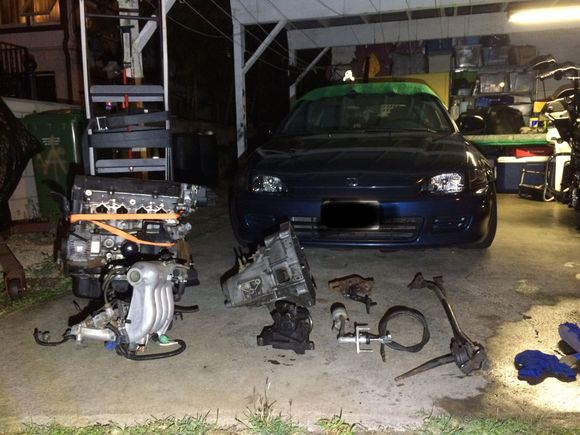 Here some of the parts I have acquired from friends. I already have clutch pedal set off a manual eg I got at the junkyard. My friend also told me I can’t run the stock b20 manifold because It will interfere with my hood, and told me to buy clutch and flywheel with some clutch lines. I’m just really lost and I feel I’m missing parts to complete this conversion.
