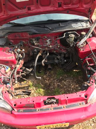 You can see the two plugs on the left side by the headlight. By the shock tower. 
I have most of it tucked away now. It was a total jumbo mess. 
The only thing that are in the corners now are my HID wires to the OG harness. 
I didn’t unplug anything just relocated them. Like I said I’m not sure what they were so I didn’t go cutting anything. Just hid them. 

