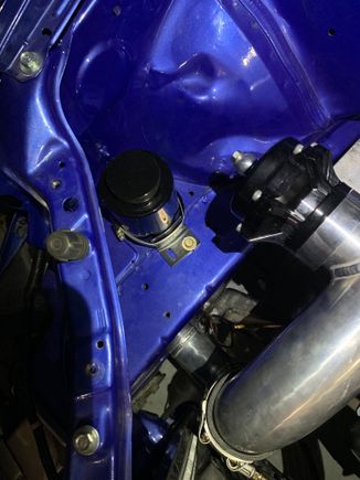 Mounted this cheap eBay overflow.. it’s not vented and I’m quite sure it should be. I’ll install a vent. Hose will run through the frame rail.. you shall see. Factory over flow would no longer fit with the intercooler piping in the way. 