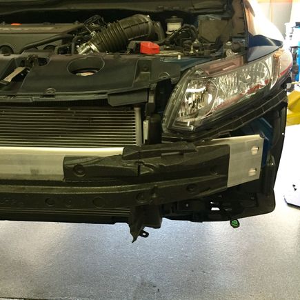 Marking where to cut crash beam foam in order to make room for tow point mounting