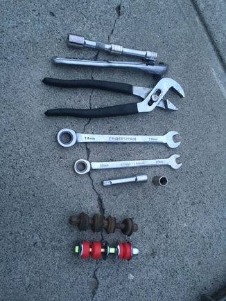 Replacing old front sway bar end links and bushings.