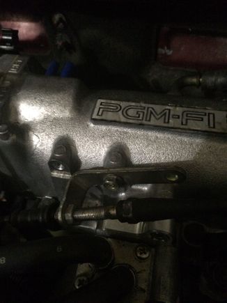 throttle cable mount. I was going to drill some new holes in the mount but couldn't find the drill under all of my mess.