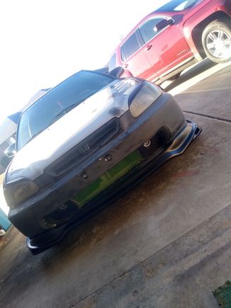 Okay so I finally got the front and rear lip kit