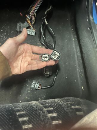 2 plugs i have no clue what for. came off of the wires that went from harness in the engine to the ecu