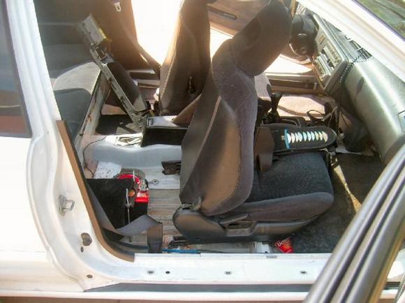 car was stripped....replaced door panels, painted acccessories black, put in carpet