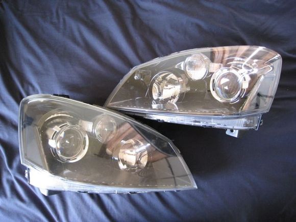 02-06 altima

e55 projectors w/ sti-r lenses
gatling gun shroud
morimoto led stripes