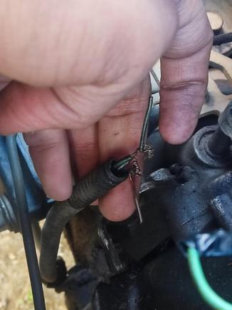 Wires coming from lower part of the car.