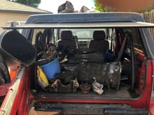 Transmission and all parts for engine rebuild in vehicle.