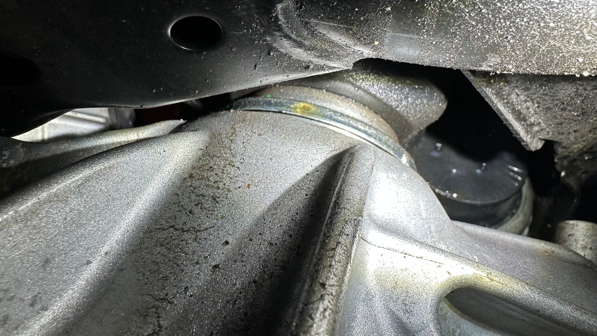 Traced it up and can see that oil is weeping from the interface of the front left axle into the diff and getting spun around and coated on things in the general vicinity 