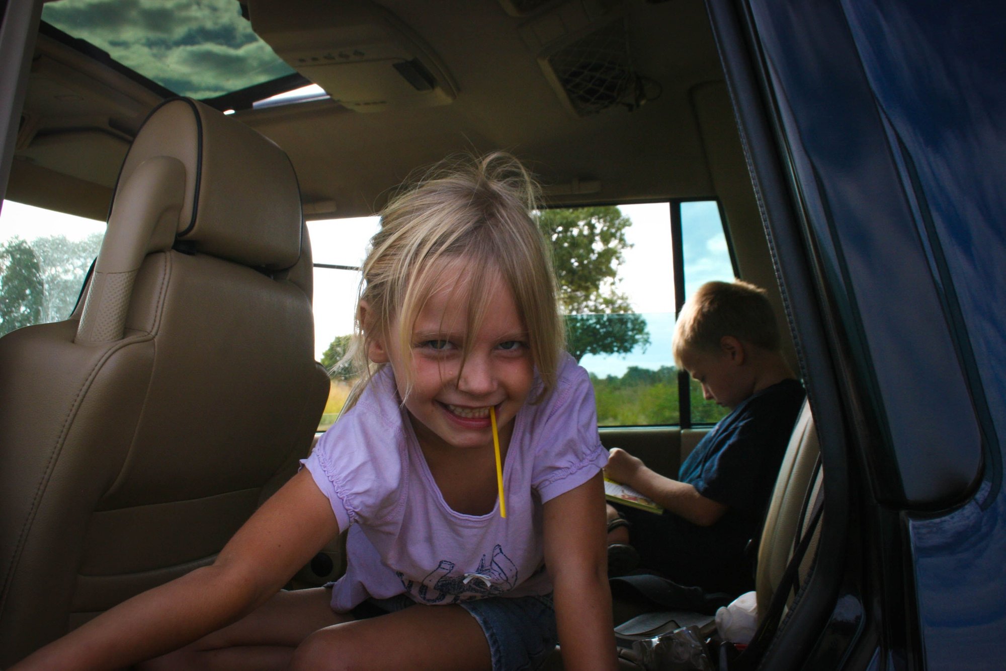 Cutie in the back seat on safari in Zambia.