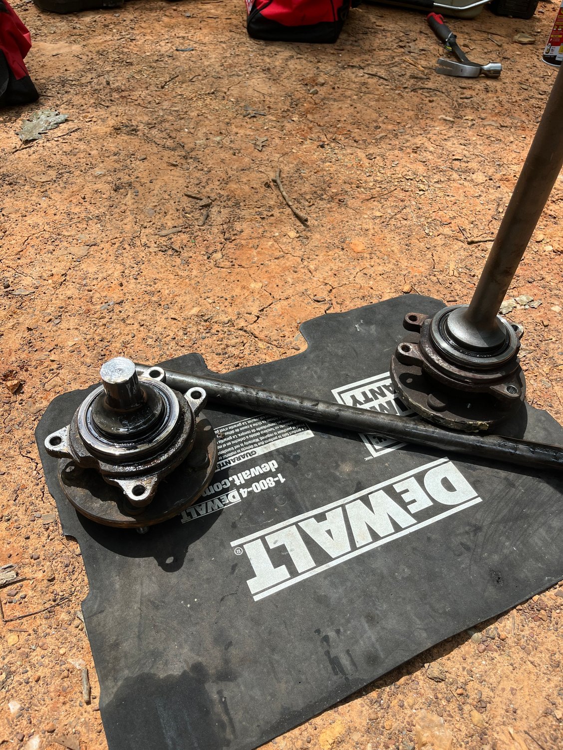 Broken shaft next to the new one. Swapped the hub and shaft. 