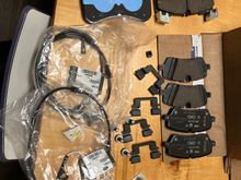 Parts arrived yesterday. Pads, wear sensors and some hardware. 