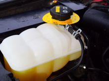 Swapped out the defective coolant expansion tank, so far no cracks or leaks.
