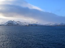 Early November 2015: Winter and final offload of the season. Big storm just passed and the harbor was full of other vessels so we had to anchor in a nearby lonely bay for the night.