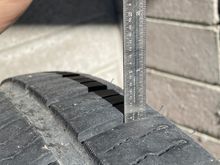 Last rear mounted tire tread