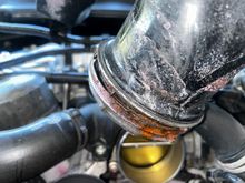 Coolant residue underneath the air breather 
