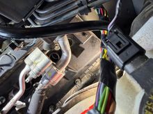 View from top of brake reservoir looking down at rear injector port.