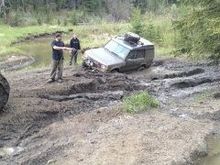 Tried to go around this mud hole and got hung on the axle! McClean Creek Alberta Canada.