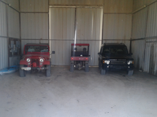 L2R-> Red "Spunky" 1979 CJ-5, chuckwagon, and "Randy" the black 2003 Disco 2 all running in their ranch barn