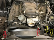 Yellow arrows are the fan electrical fasteners and red arrow are the hose clamps for the upper radiator hose