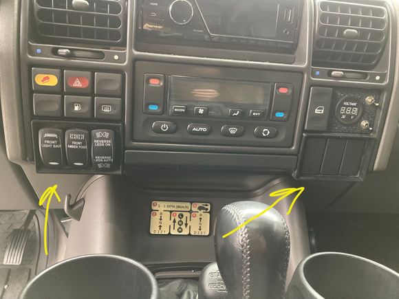 3D printed rocker switch panels. (L): light bar, amber fogs, and two function LED backup lights (ON/Auto ON in reverse).

Volt meter in place of clock with power switch, and ign off override switch for power to USB charging sockets.