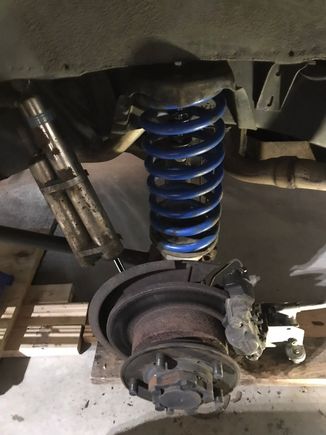 7100s and big blues in rear. Hard to see but a bump stop is inside spring…though if ever hit would blow a hole in the floor lol