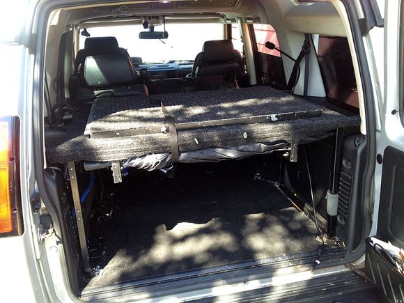 Image showing when the deck is folded. The entire unit is made of aluminum square tubing and welded.