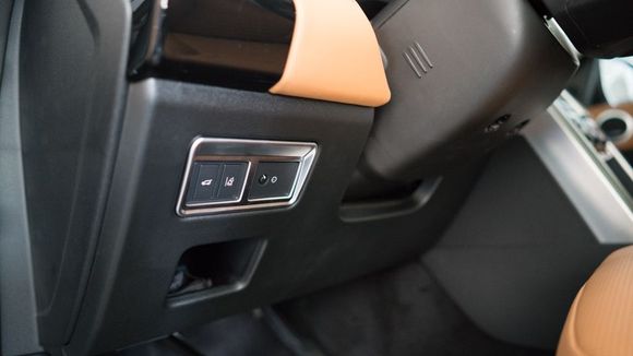 Driver side rear gate control plate.