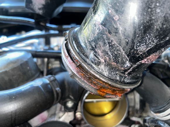 Coolant residue underneath the air breather 
