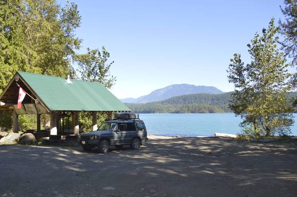 Here is my Disco, it was a 7 seater, the jump seats and 60% seat are removed.    The tent, awning and bars work out to about 150 lbs in total.  Even empty I have no significant body roll.  My off road load is kept below the rear window line.