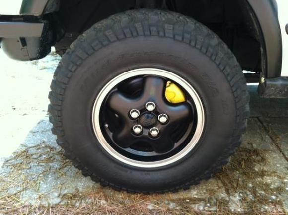 yellow caliper converted to yellow after seeing a silver Porsche Panamerica the other day... tired of red and the red was peeling/ Painted wheel with VHT Epoxy paint 'Satin'